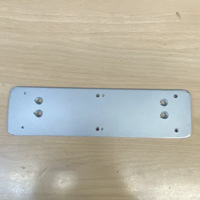 PLACA ADAPTACION CIERRAPUERTA TP PLATA JUSTOR